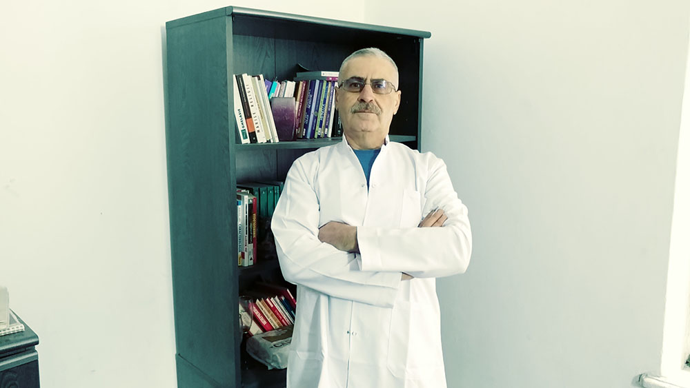 Horia Marculescu, MD in his office image